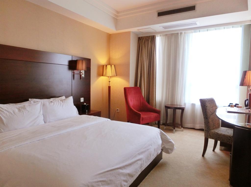 Ramada Shanghai Wujiaochang Номер фото